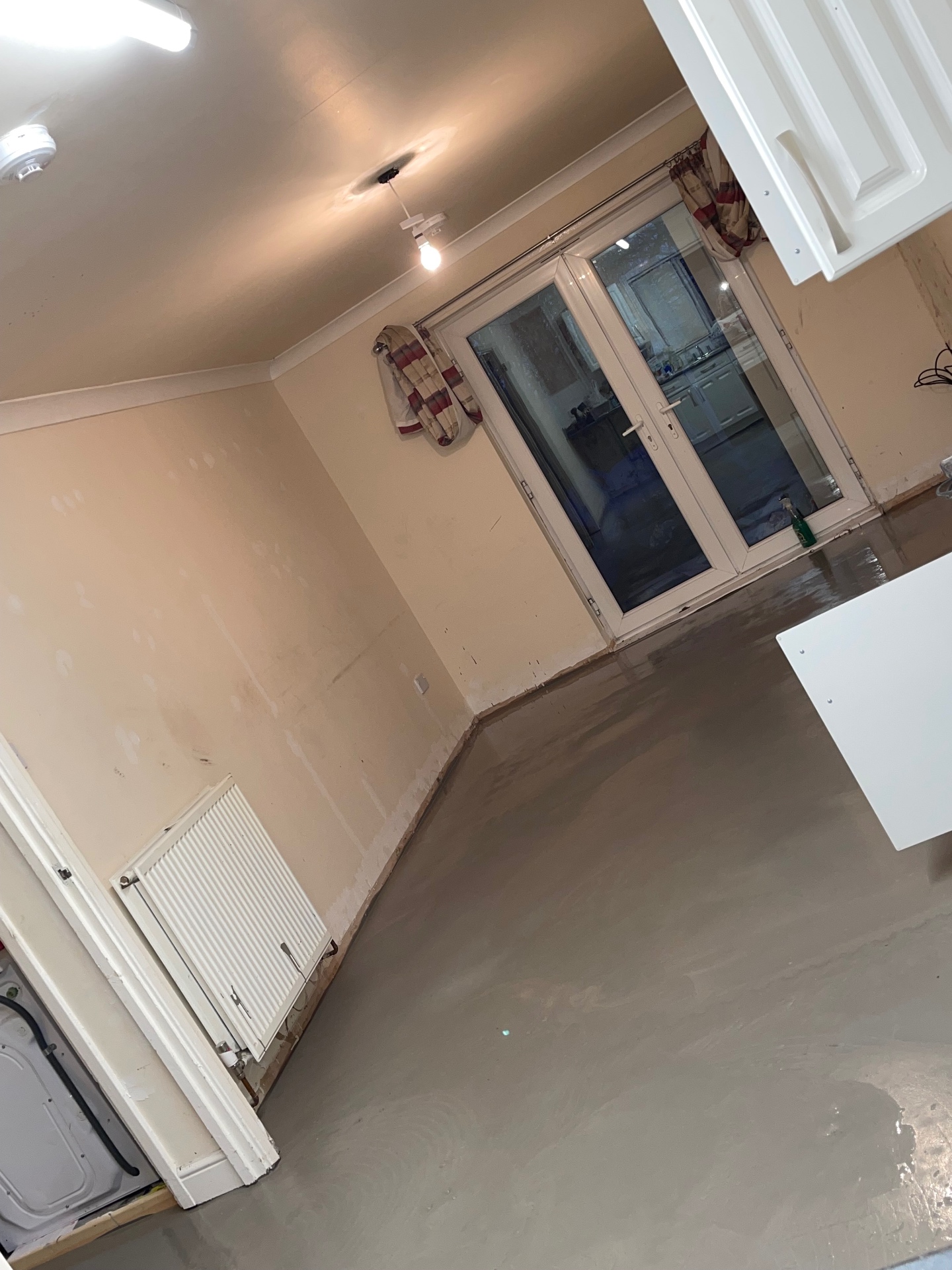 Cured self-levelled floor ready for tiling