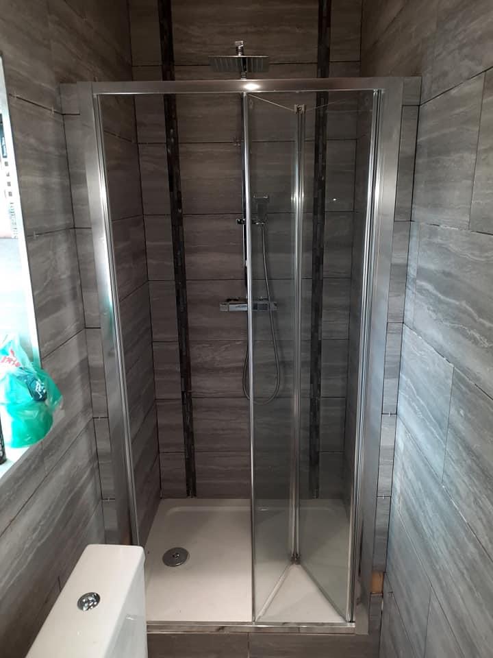 Walk-in shower enclosure in a renovated Sheffield bathroom